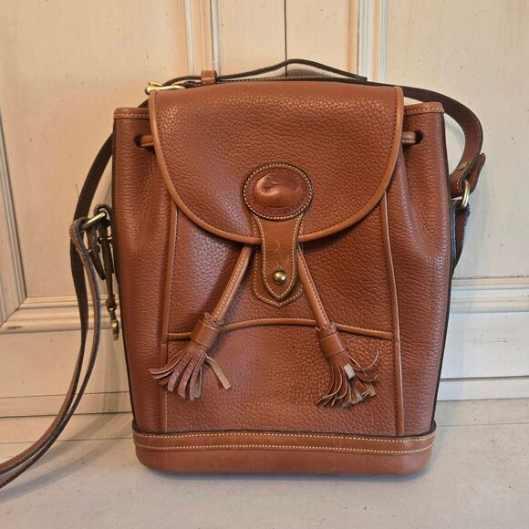 Dooney & Bourke Handbags - Dooney & Bourke Dover Drawstring Cross Body Tan Pebble Leather 90s Purse